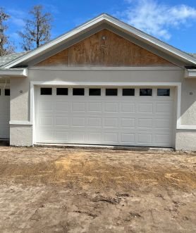 White Steel Garage Door Installation with Clean, Modern Finish in Palm Coast, FL White Steel Garage Door Installation with Clean, Modern Finish in Palm Coast, FL